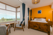 Principal bedroom with sea view and en-suite